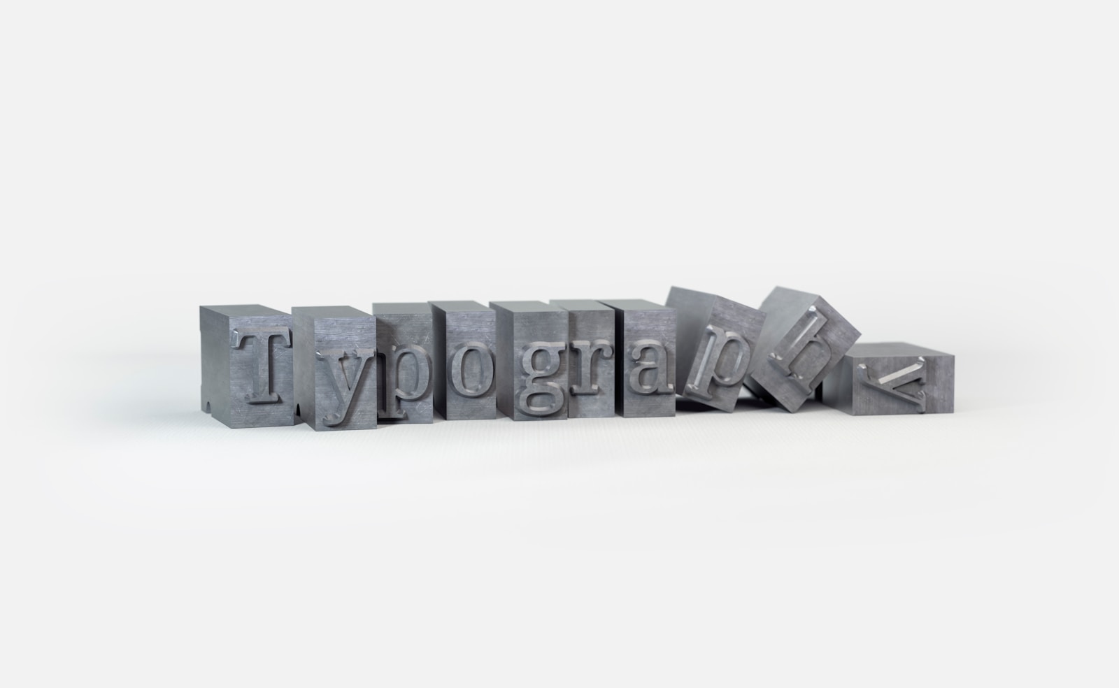 Letterpress type blocks — naming an AI company